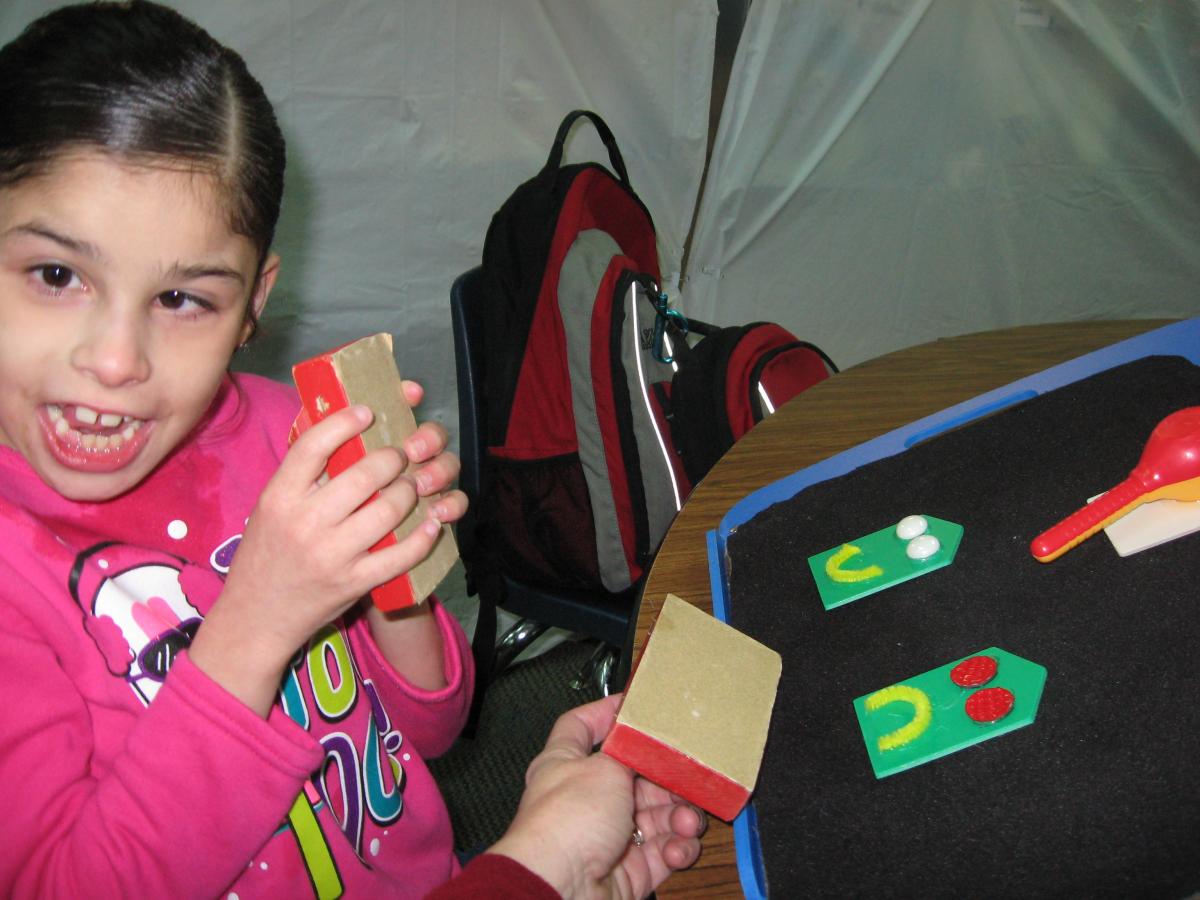 Student using tactile items