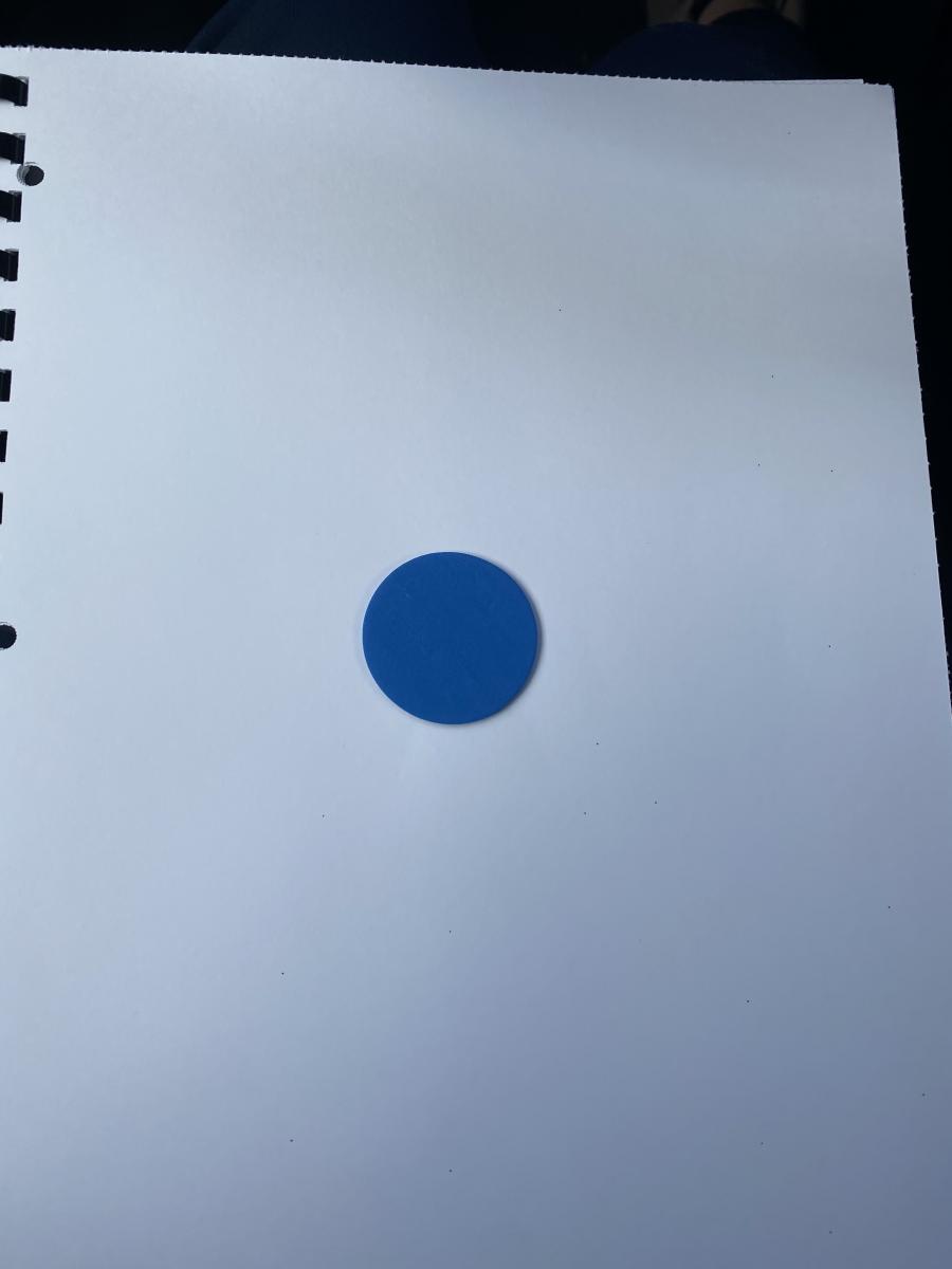 Circle in center of page of texture book