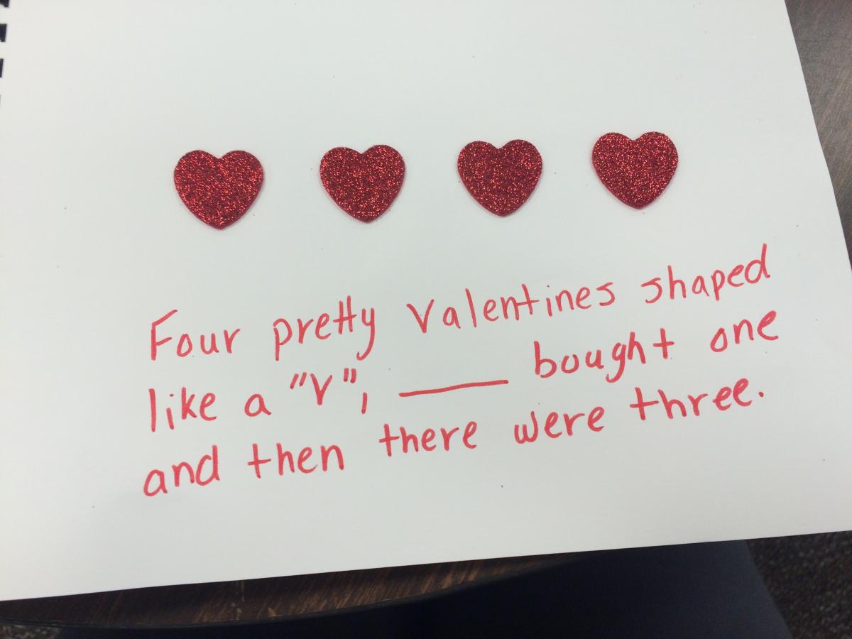Four pretty valentines shaped like a "v", __ bought one and then there were three.