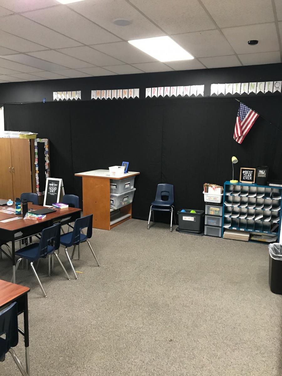 Black wall in classroom adapted for student with CVI