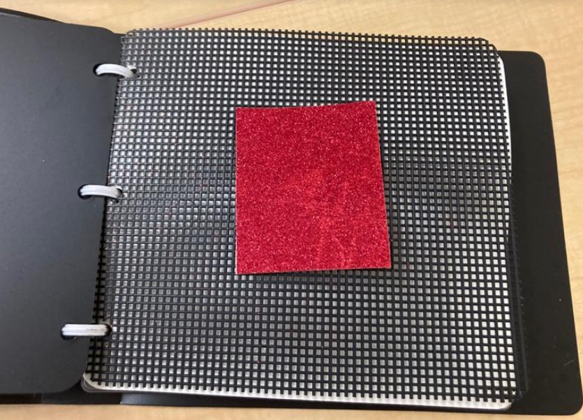 APH book builder page with a sqare piece of glittery fabric