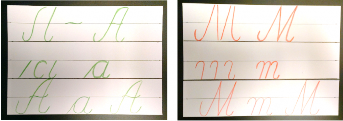 Handwritten letters "A" and "M"