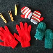 pairs of mittens with clothespins 