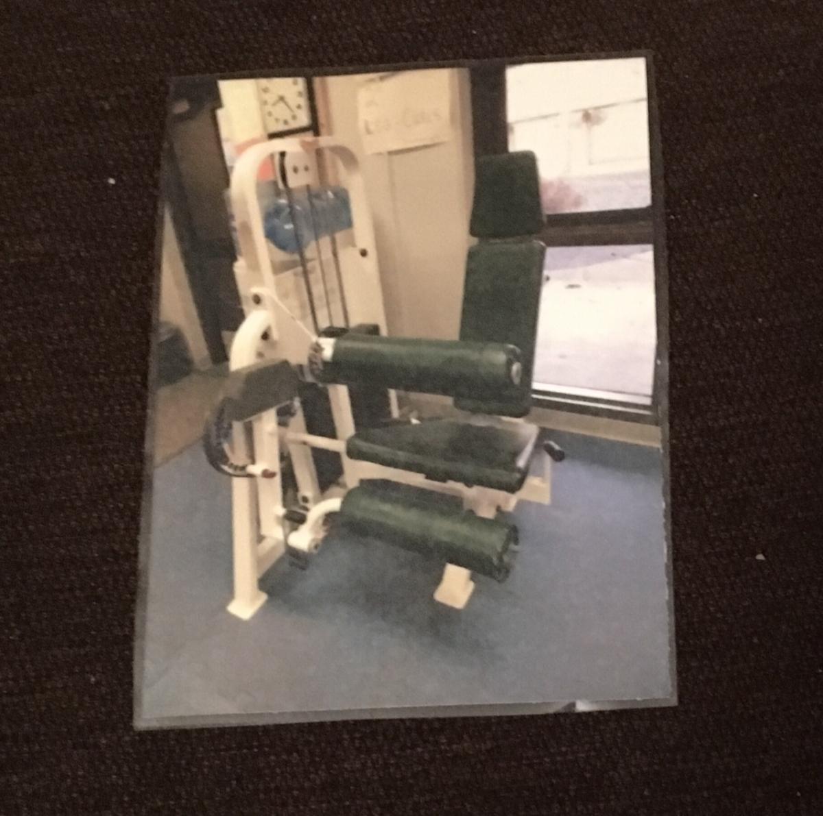 a card with a picture of exercise equipment