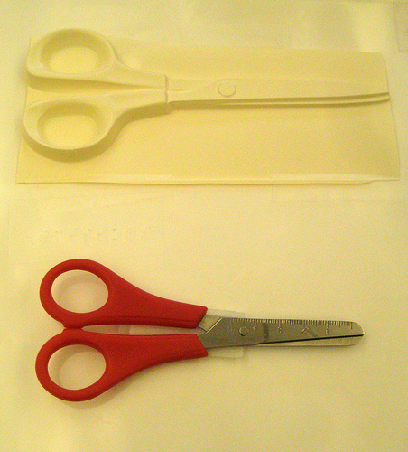 Tactile form of scissors with real scissors
