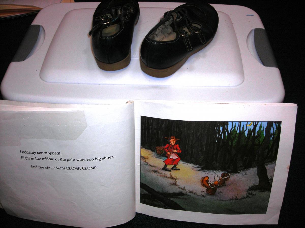 Photo of shoes and page of book