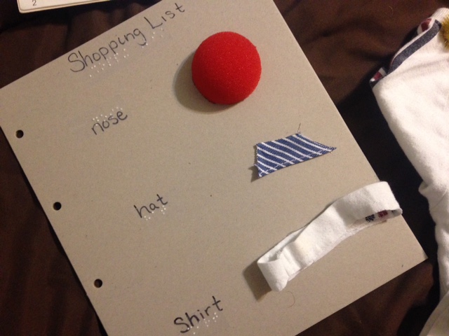 Braille shopping list with tactile objects
