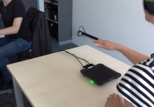 HaptiRead: Reading Braille as Mid-Air Haptic with person displaying it