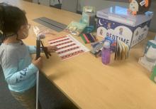 Preschooler looking at Bedtime in a Box