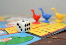 Board game with goose pieces and dice
