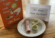 Green Eggs and Ham book with plate of green eggs and ham