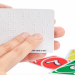 Fingers reading braille on UNO card