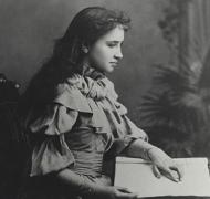 Helen Keller reading a book