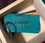 Happy Birthday tag in print and braille