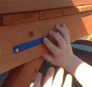 Reading braille labels on playground