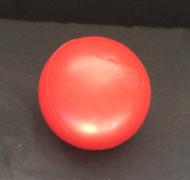 Red ball on black background