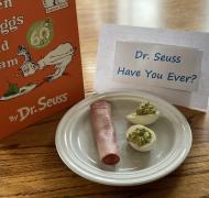 Green Eggs and Ham book with plate of green eggs and ham
