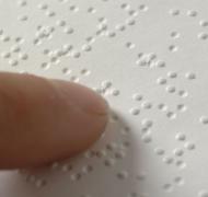 Finger reading braille