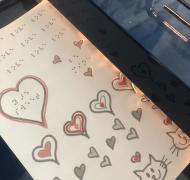 page with hearts and braille in PIAF machine 