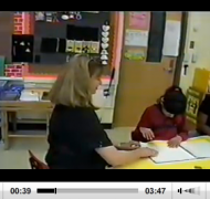 Still from video of Robbie Blaha and student