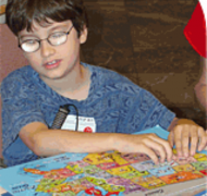 Boy Reading a Map (from AAF website)