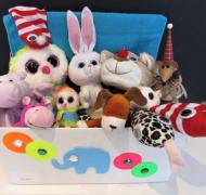 stuffed toys in a small toy box