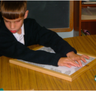 Child Using Math Window Braille 