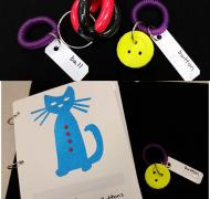 Top: 2 object key chains with braille tags (Ball and Button). Bottom: Adapted Pete the Cat book with paired object (button).