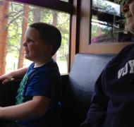 Boy riding on a train