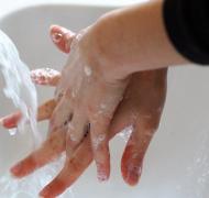 washing hands under running water