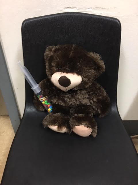 Another Teddy Bear with syringe of M & Ms