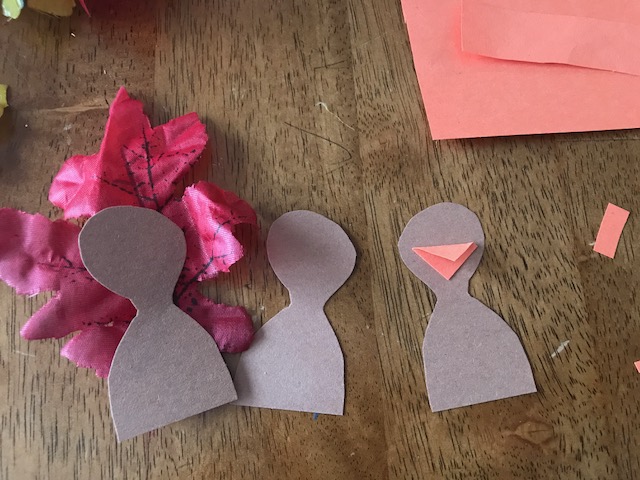 turkey shapes cut out of brown construction paper