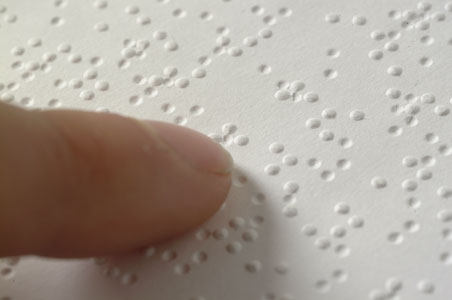 Finger reading braille