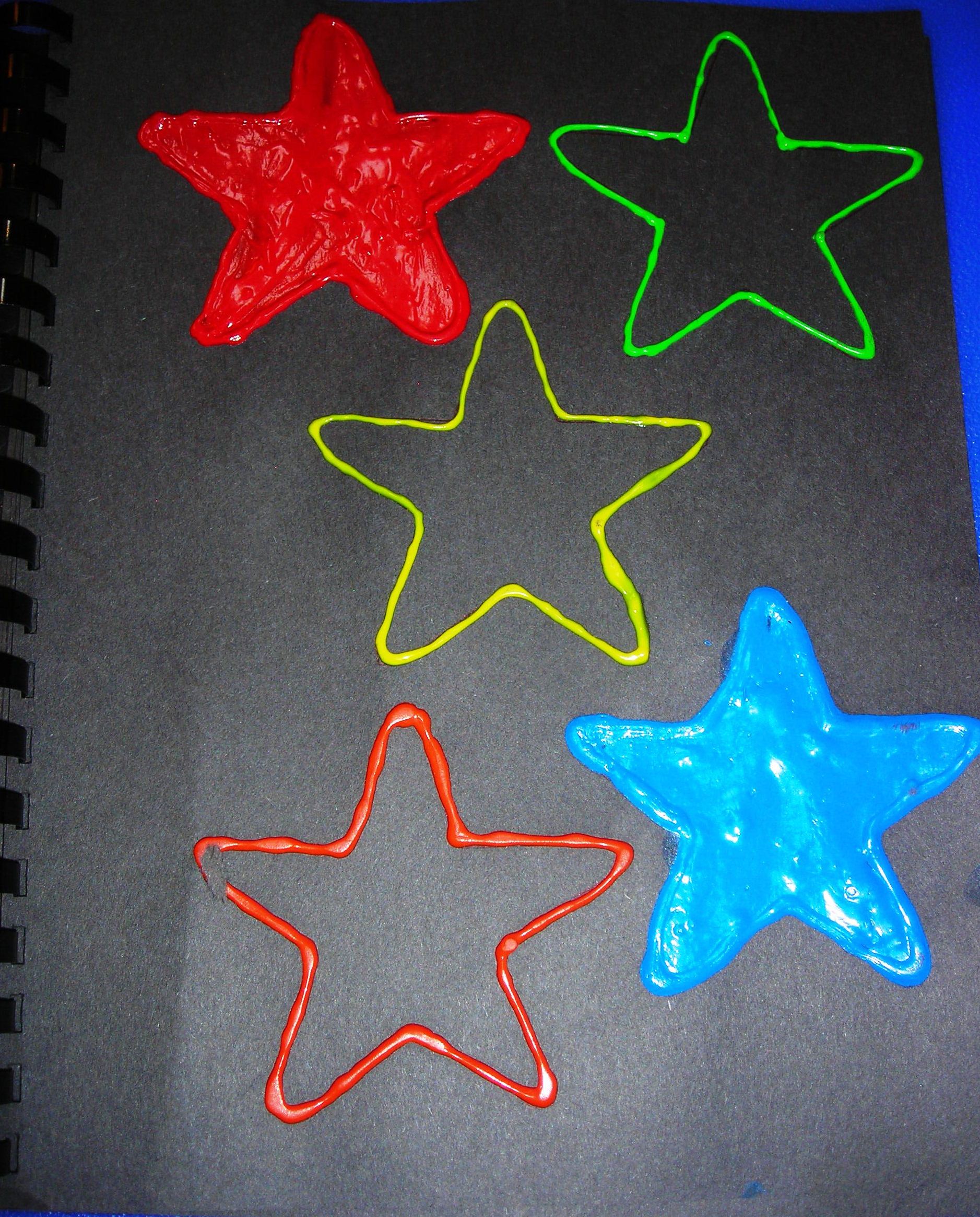 Colored stars on black background