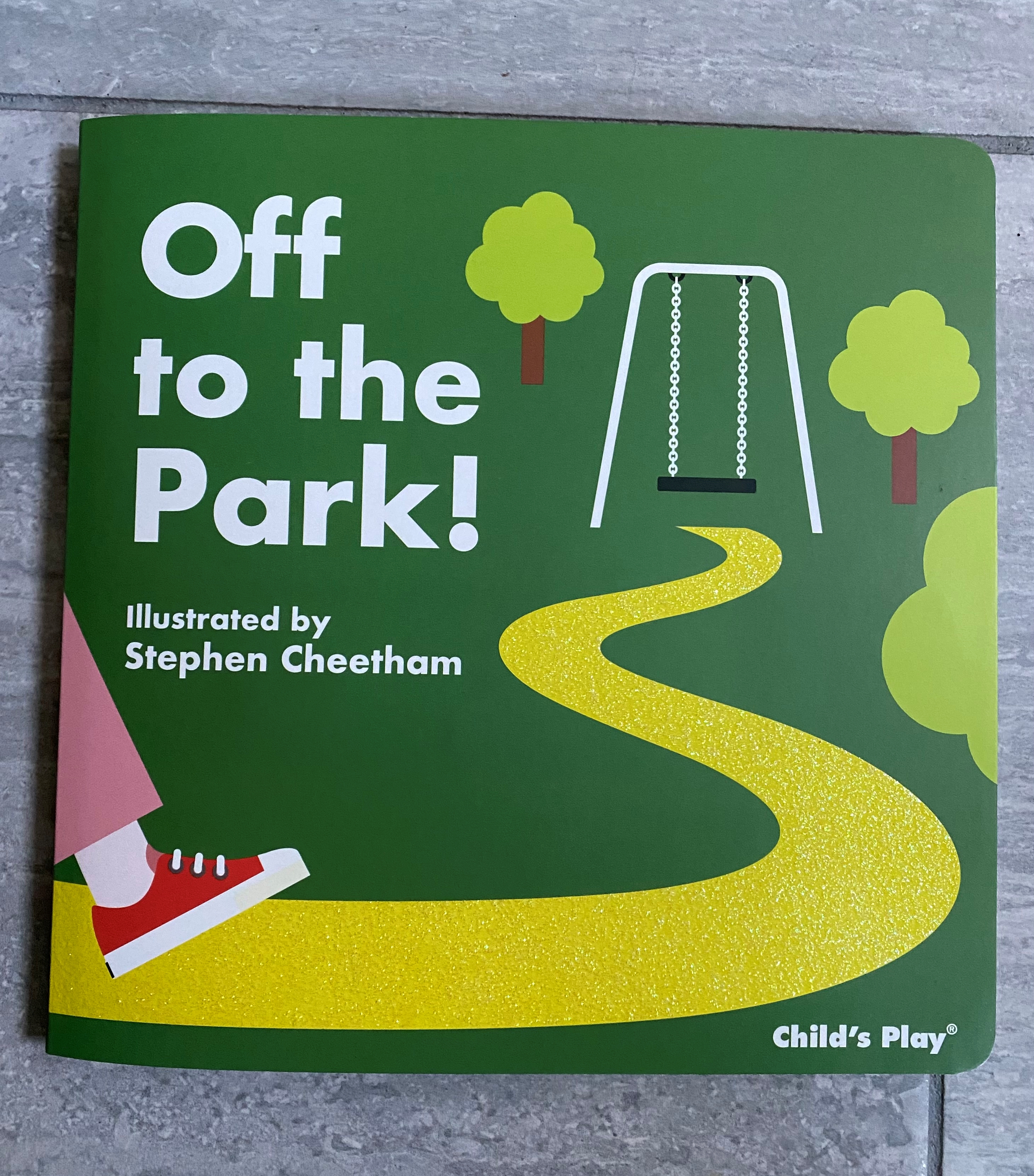 Book Cover of Off to the Park with a picture of a path with a leg walking to the playground swing