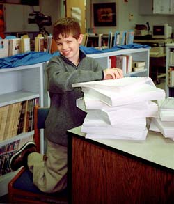 Boy reading braille