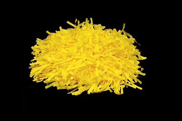 Yellow pompom on black background