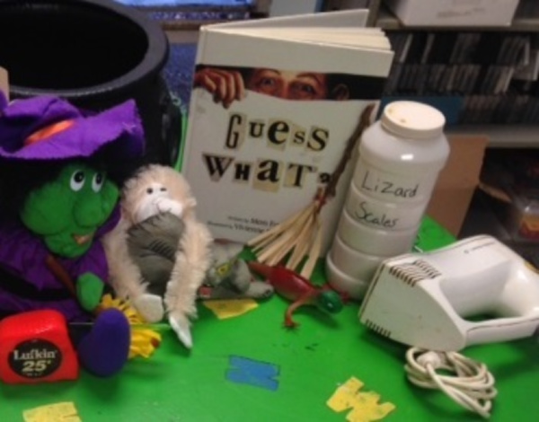 items from the story box including plush toys and the book