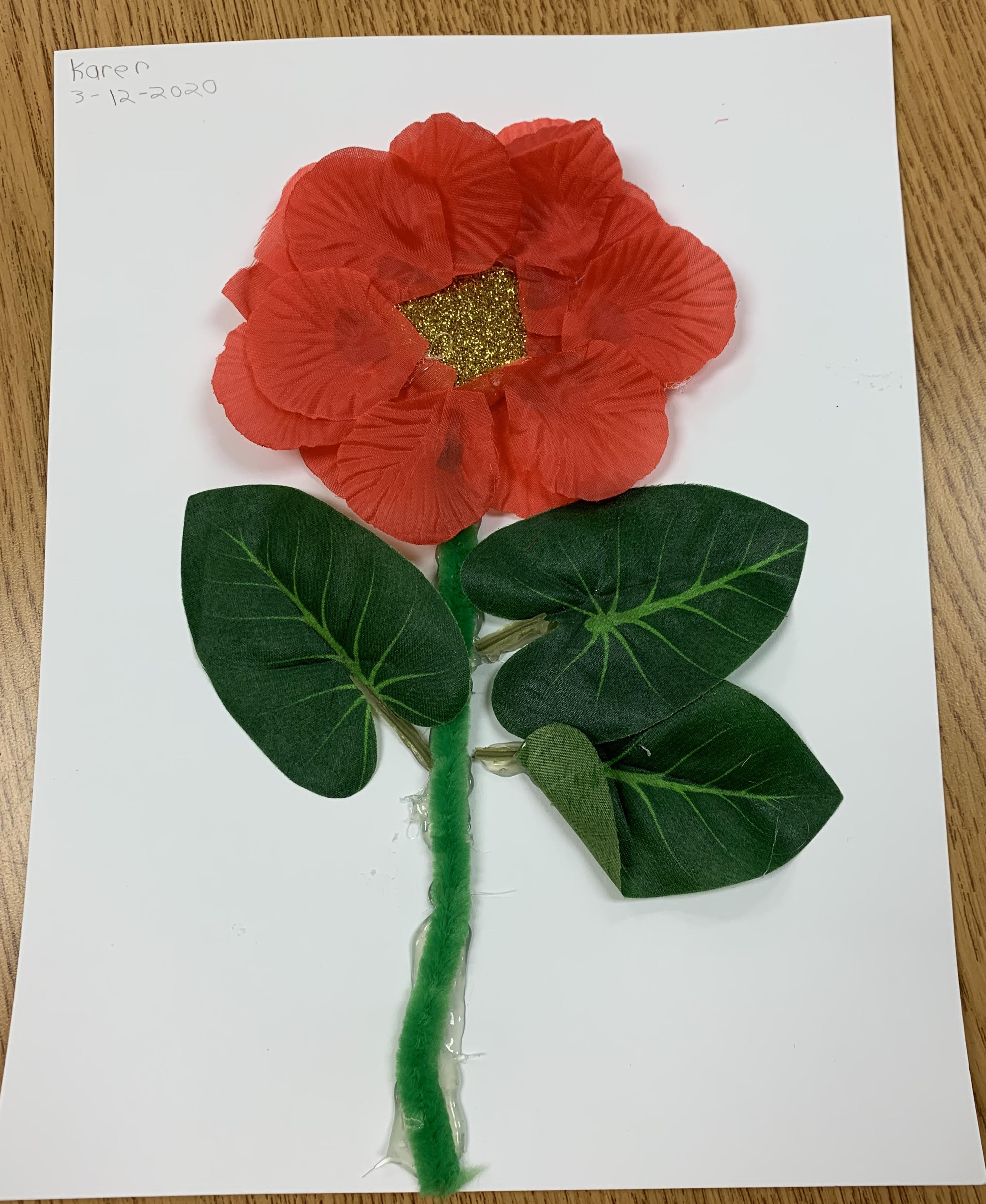 tactile flower glued on paper