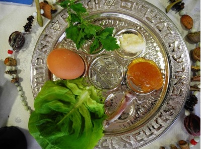 a seder plate with traditional foods for Passover