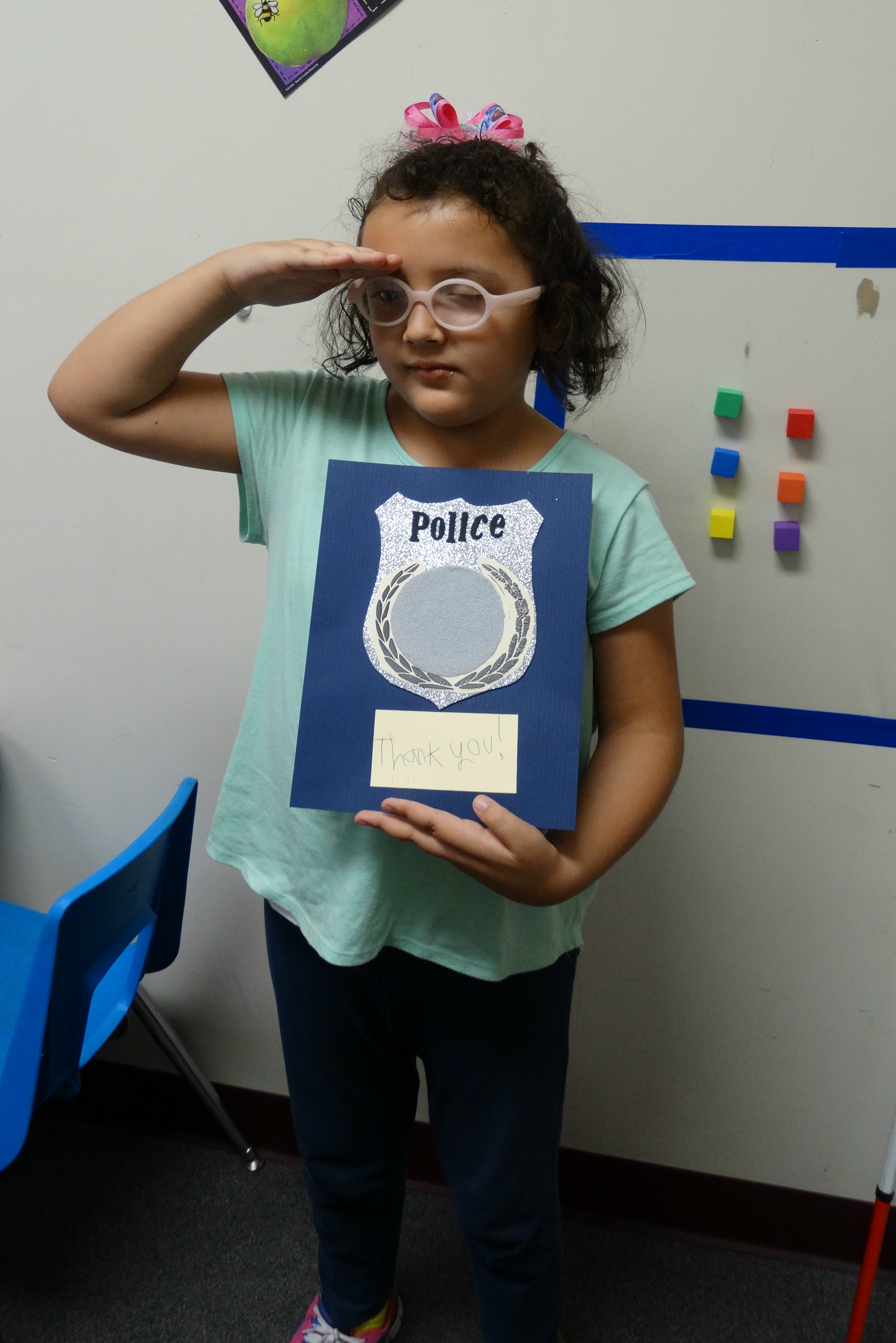 girl holding police letter