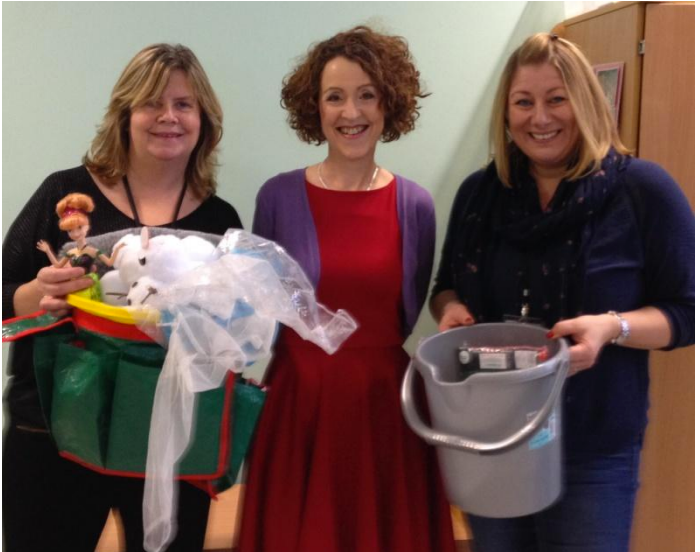 Three women with story buckets