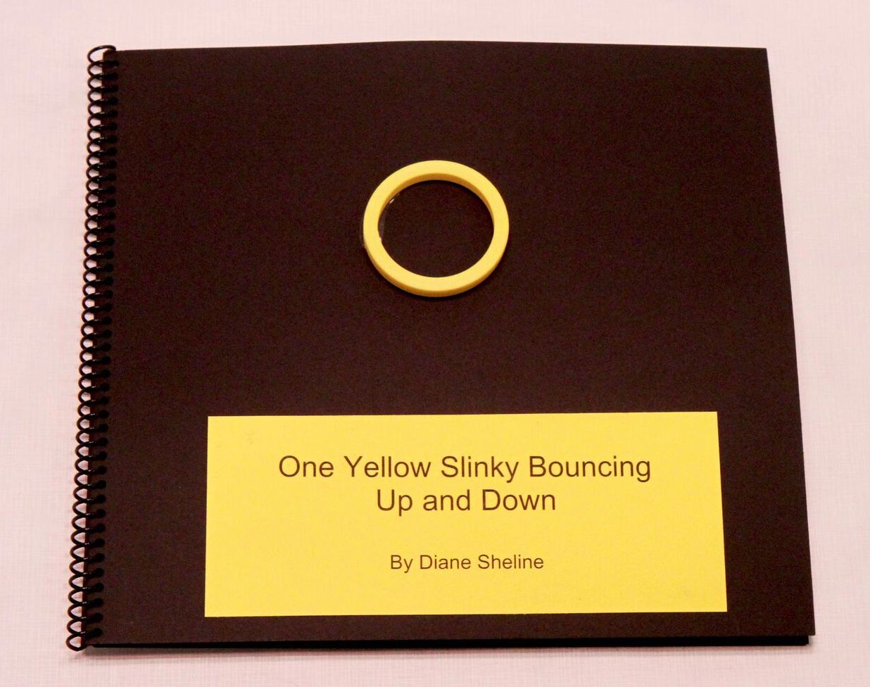 Cover of One Yellow Slinky Bouncing Up and Down