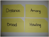 Brailled vocabulary words "distance, among, broad, howling"