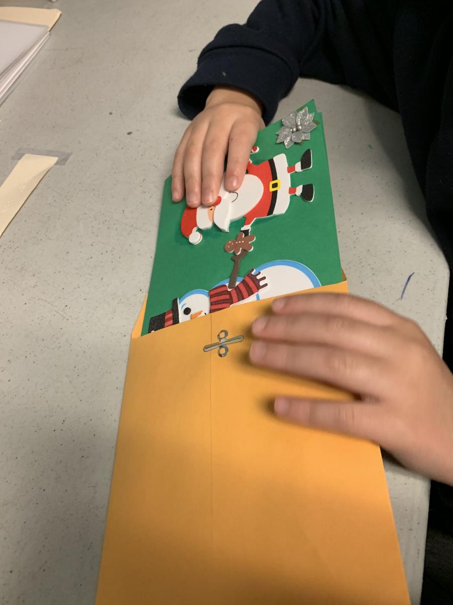 Placing the card in the envelope